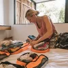 Woman packing for Zimbabwe trip